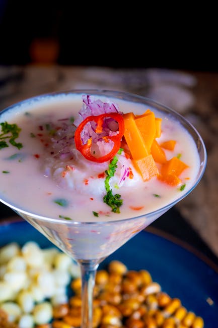 Savory Espresso Martini Recipes with Spicy, Sweet and Floral Twists 1 Delicious Peruvian ceviche served elegantly in a martini glass.