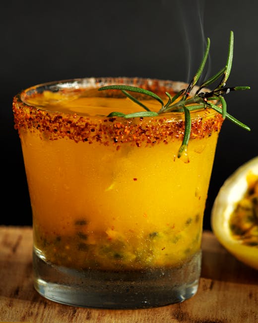 Vibrant mezcal cocktail enhanced with passion fruit and herbs in Guanajuato, Mexico.